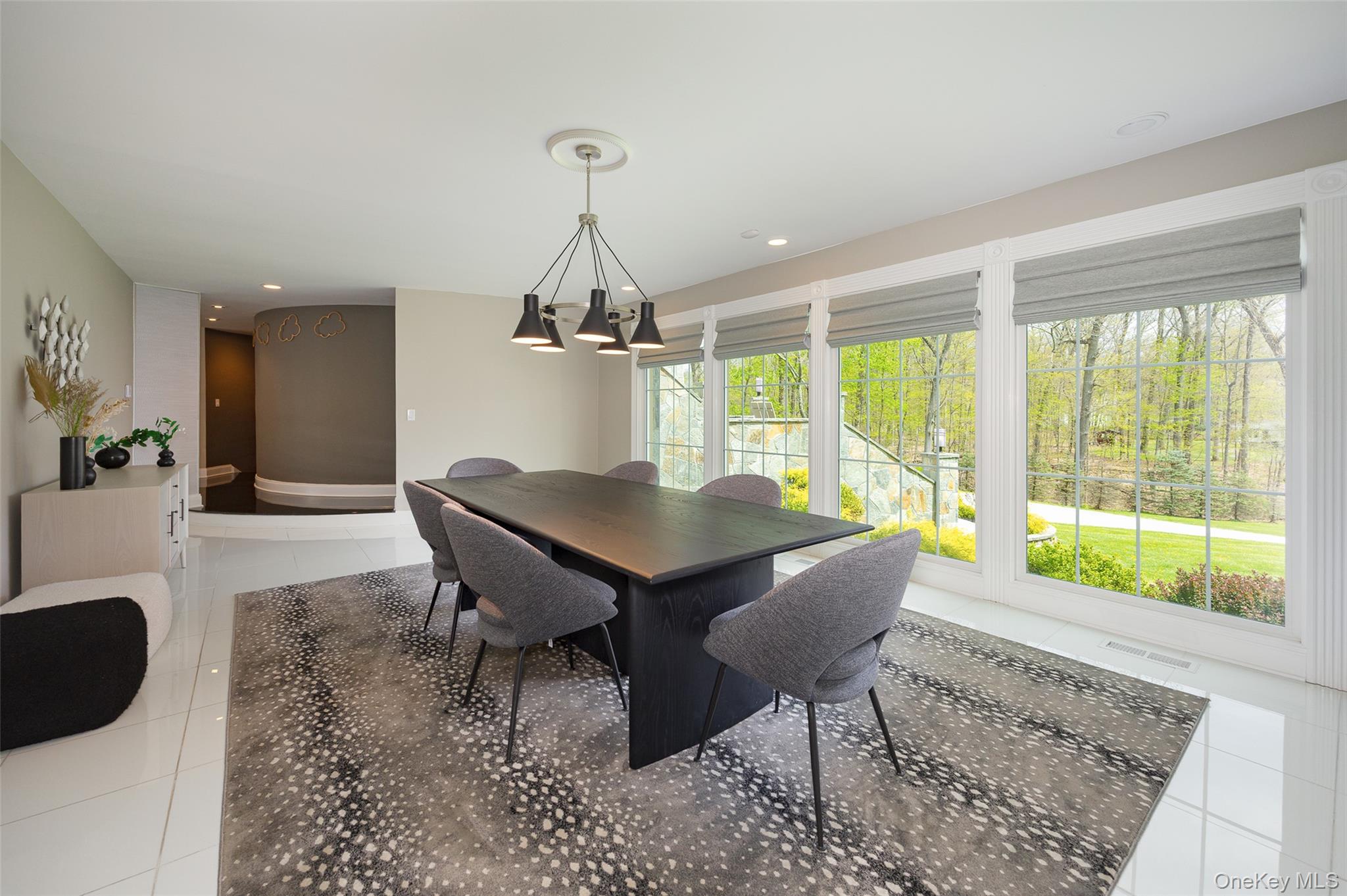 10 Quail Ridge Road Hyde Park, NY 12538 - Photo 18 of 40 a view of a dining room with furniture window and outside view