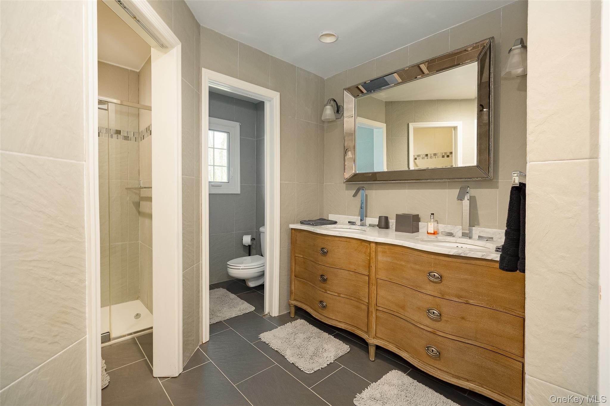 10 Quail Ridge Road Hyde Park, NY 12538 - Photo 32 of 40 a bathroom with a granite countertop sink mirror and a toilet