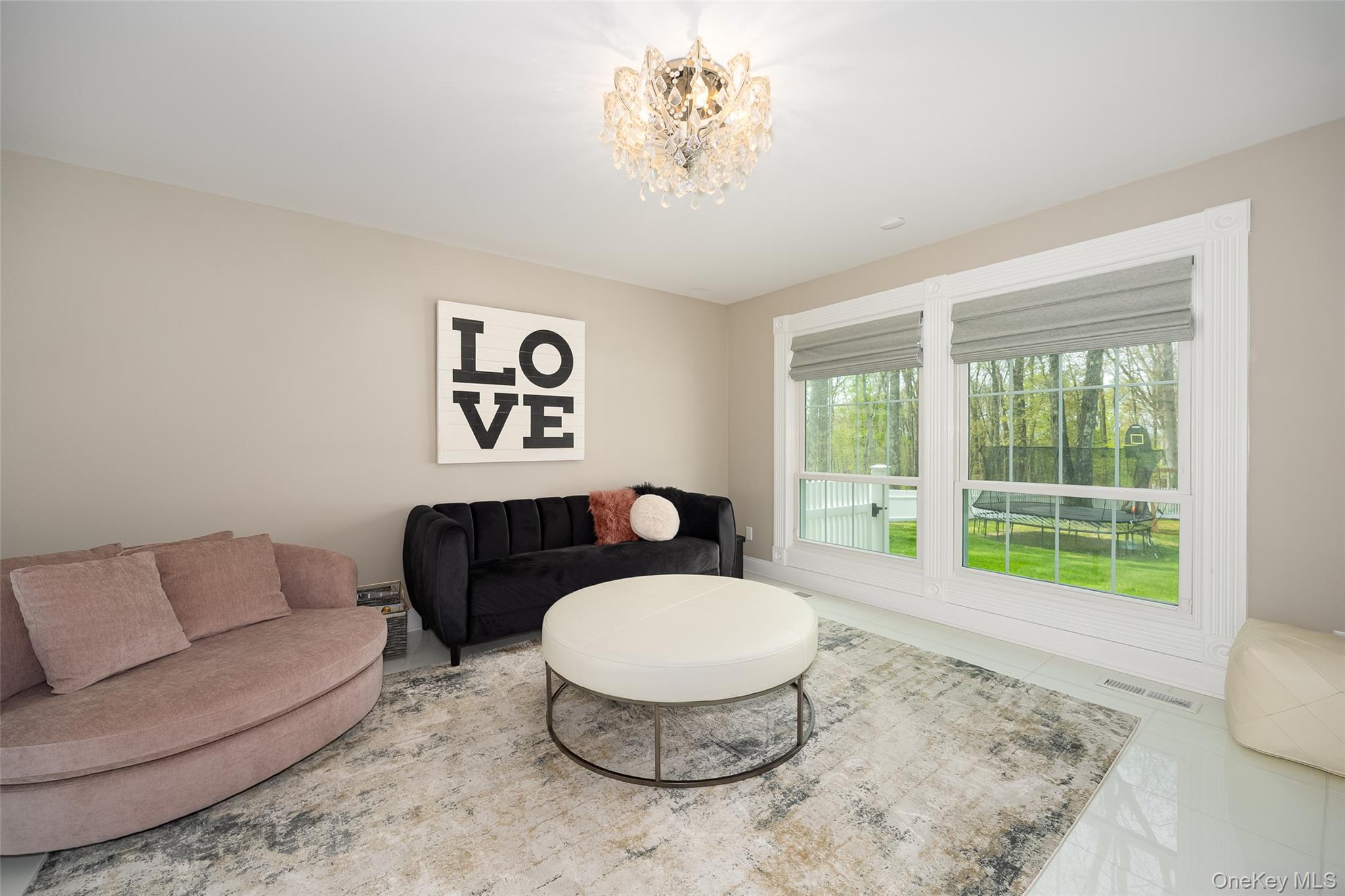 10 Quail Ridge Road Hyde Park, NY 12538 - Photo 6 of 40 a living room with furniture and a large window