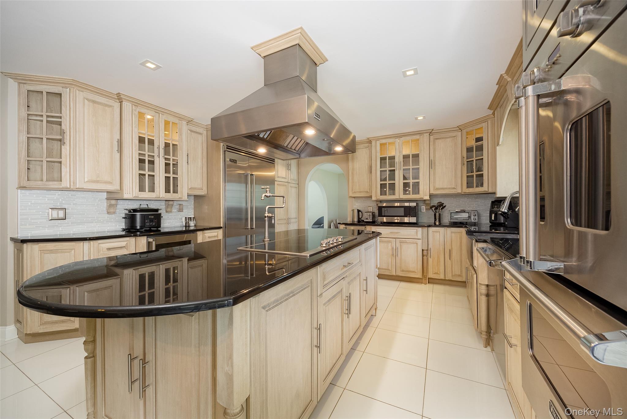 10 Quail Ridge Road Hyde Park, NY 12538 - Photo 8 of 40 a large kitchen with granite countertop a sink and cabinets