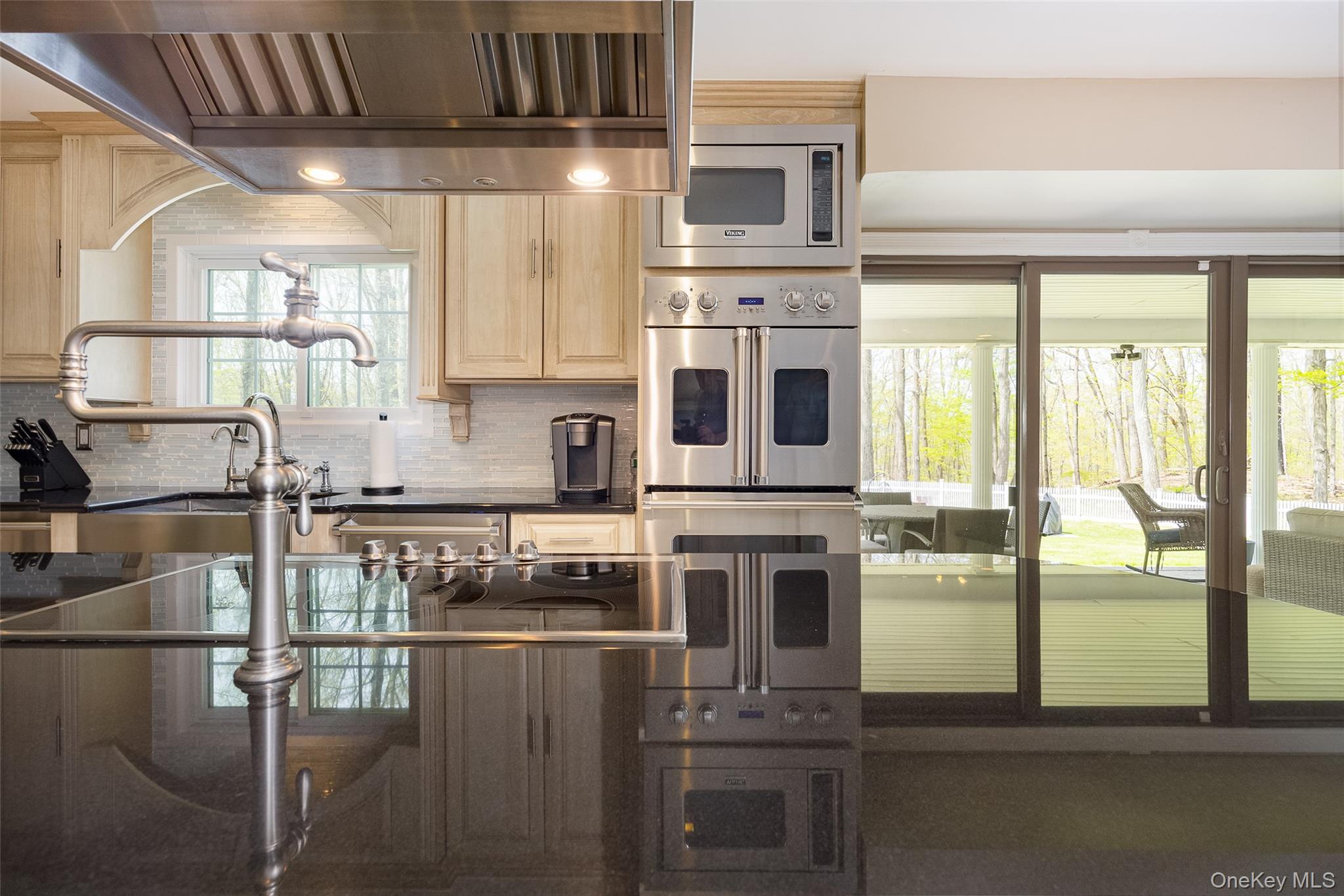 10 Quail Ridge Road Hyde Park, NY 12538 - Photo 10 of 40 a kitchen with stainless steel appliances granite countertop a stove and a refrigerator