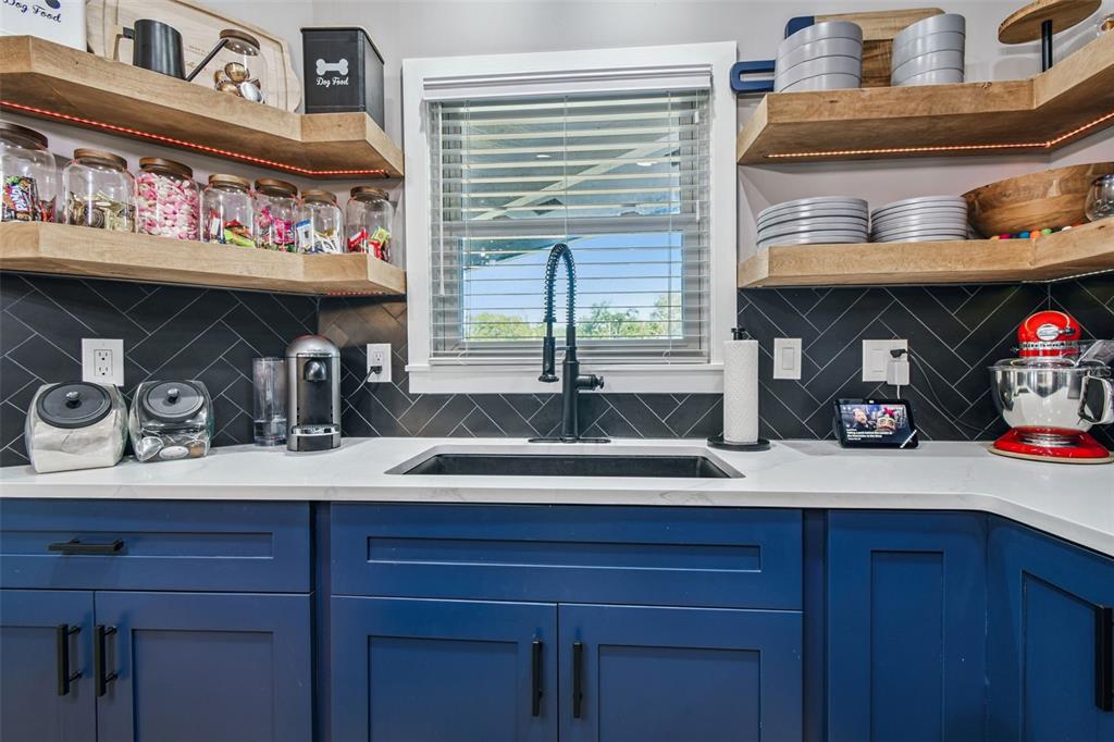 1729 Lakecrest Avenue Brandon, FL 33510 - Photo 14 of 51 a kitchen with a sink and a stove