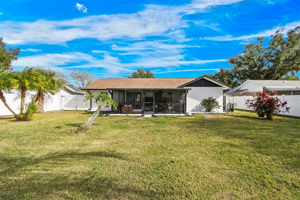 1729 Lakecrest Avenue Brandon, FL 33510 - Photo 2 of 51 a front view of house with yard space and swimming pool