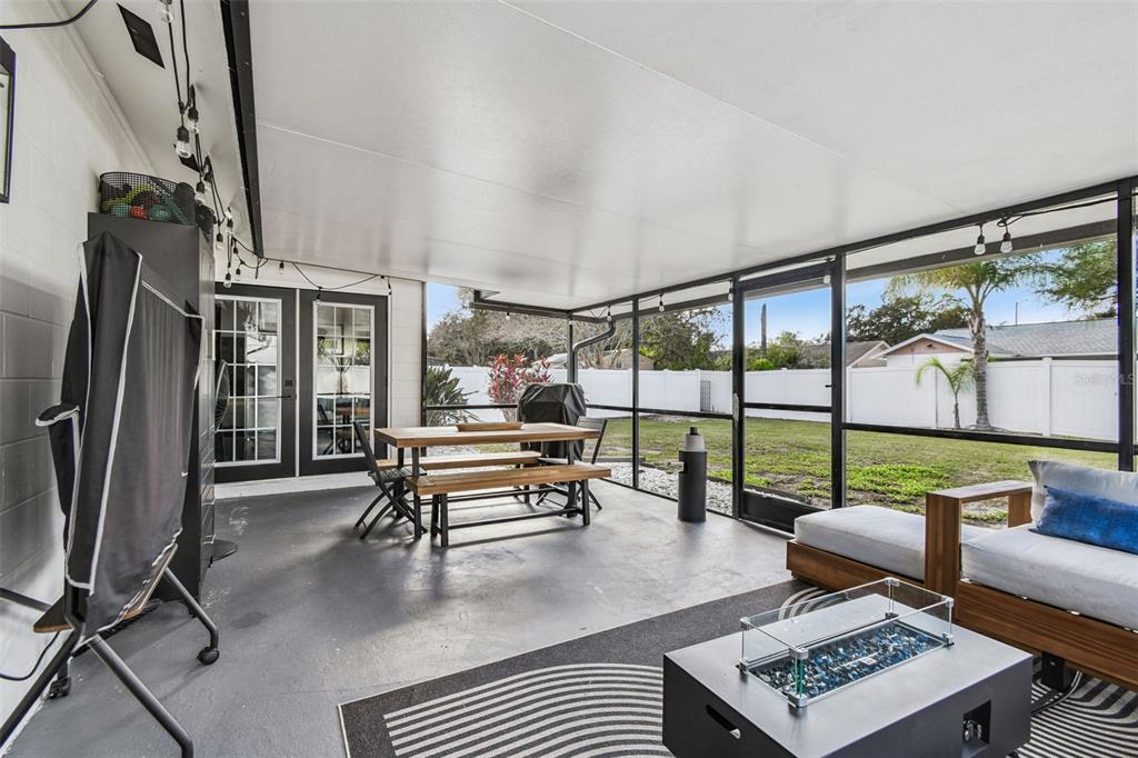 1729 Lakecrest Avenue Brandon, FL 33510 - Photo 33 of 51 a living room with furniture a large window with outer view