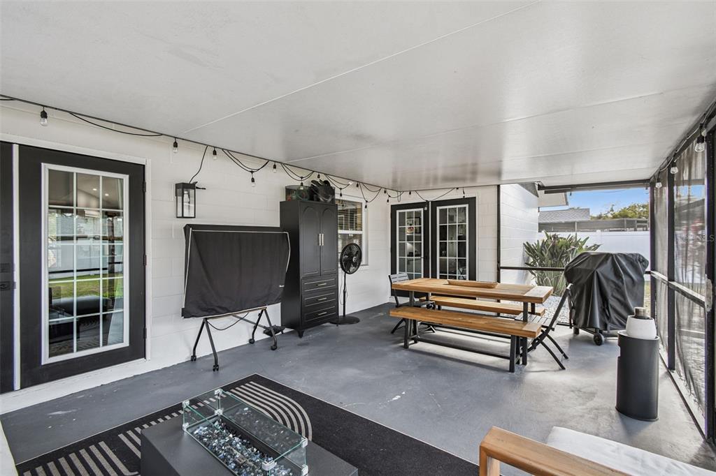 1729 Lakecrest Avenue Brandon, FL 33510 - Photo 35 of 51 a living room with furniture fireplace and a flat screen tv