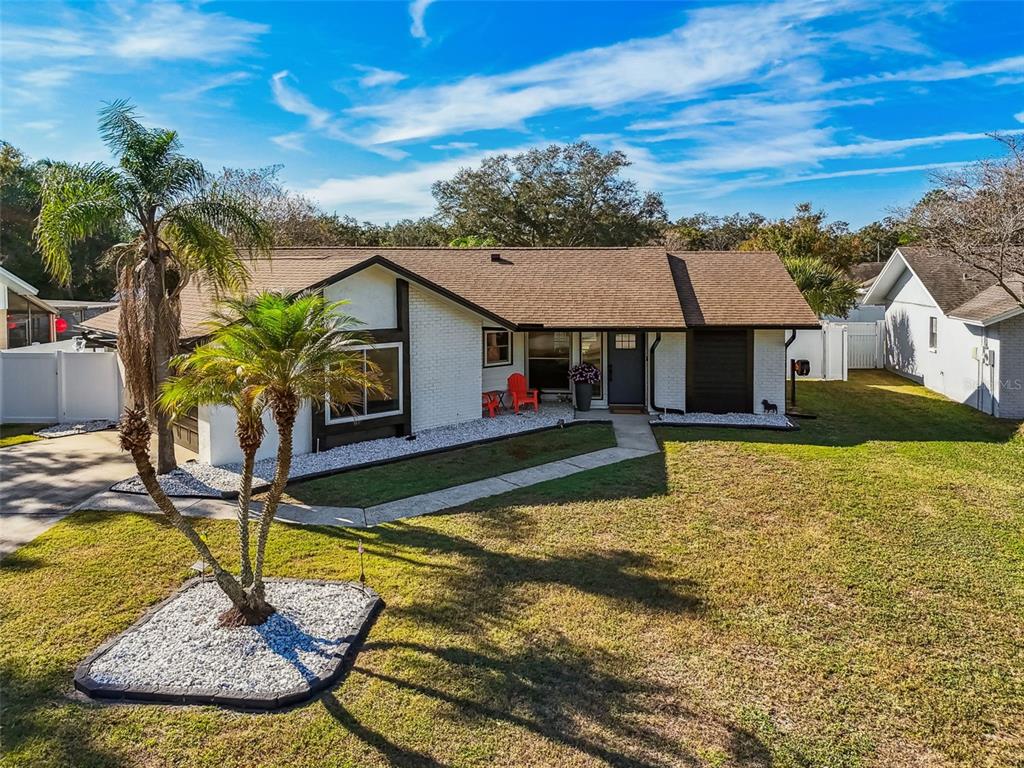 1729 Lakecrest Avenue Brandon, FL 33510 - Photo 43 of 51 a swimming pool view with a seating space