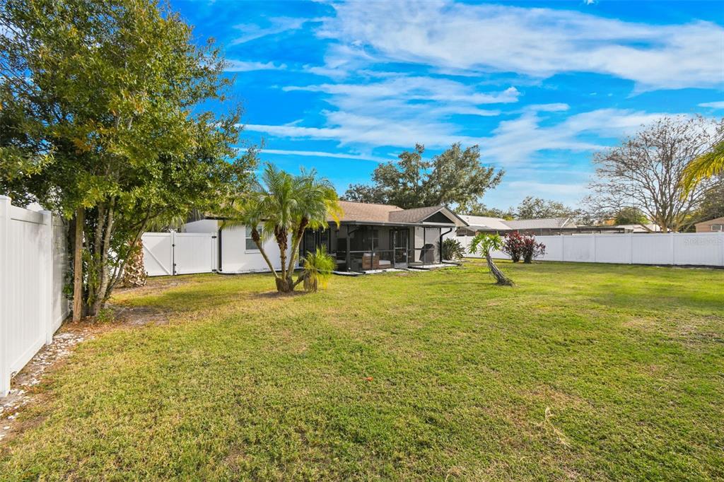 1729 Lakecrest Avenue Brandon, FL 33510 - Photo 48 of 51 a front view of a house with a yard