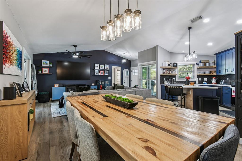 1729 Lakecrest Avenue Brandon, FL 33510 - Photo 10 of 51 a kitchen with stainless steel appliances kitchen island granite countertop a stove top oven a sink a counter top space and cabinets