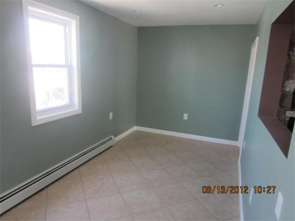 19 Marble Street Fall River, MA 02721 - Photo 12 of 30 a view of an empty room with a window