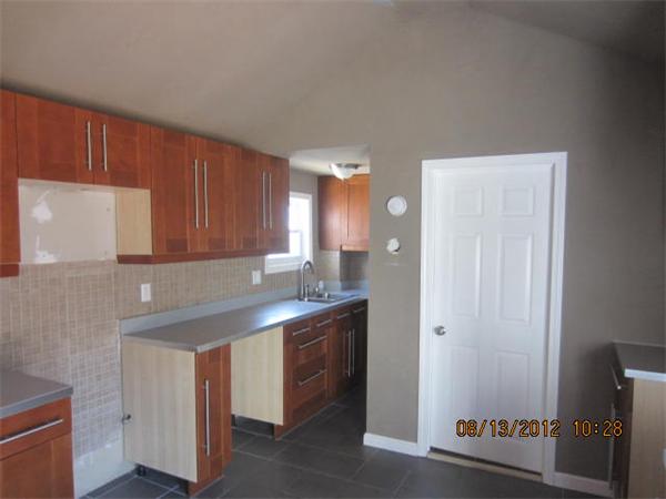 19 Marble Street Fall River, MA 02721 - Photo 15 of 30 a kitchen with a sink and cabinets