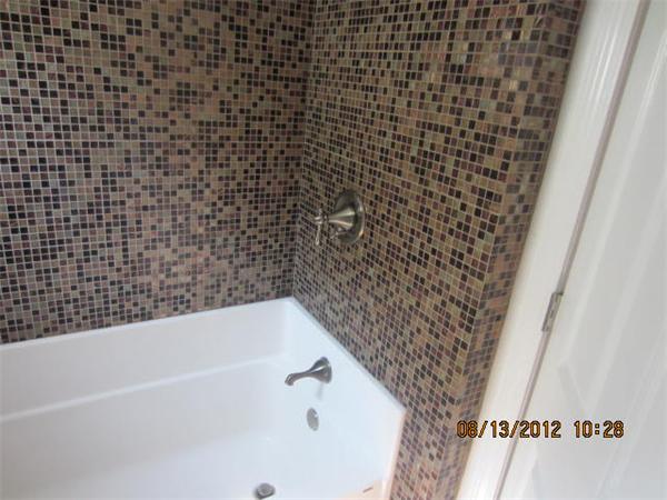 19 Marble Street Fall River, MA 02721 - Photo 20 of 30 a bathroom with a bathtub