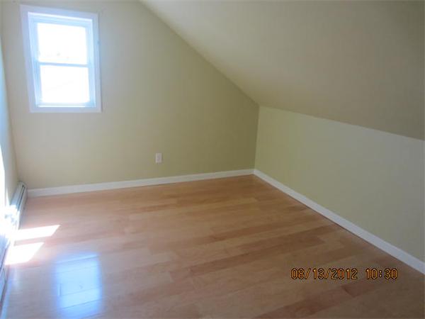 19 Marble Street Fall River, MA 02721 - Photo 21 of 30 an empty room with a window