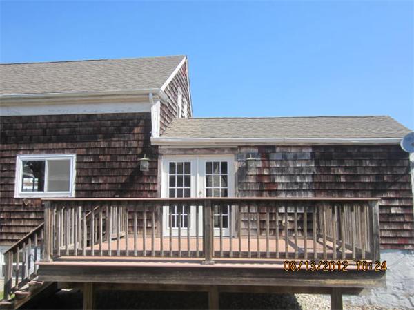 19 Marble Street Fall River, MA 02721 - Photo 6 of 30 a front view of a house with a lake view