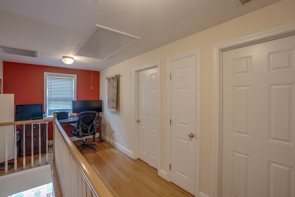 11 Spring Road, Unit A Arlington, MA 02476 - Photo 14 of 20 a view of a room with gym equipment
