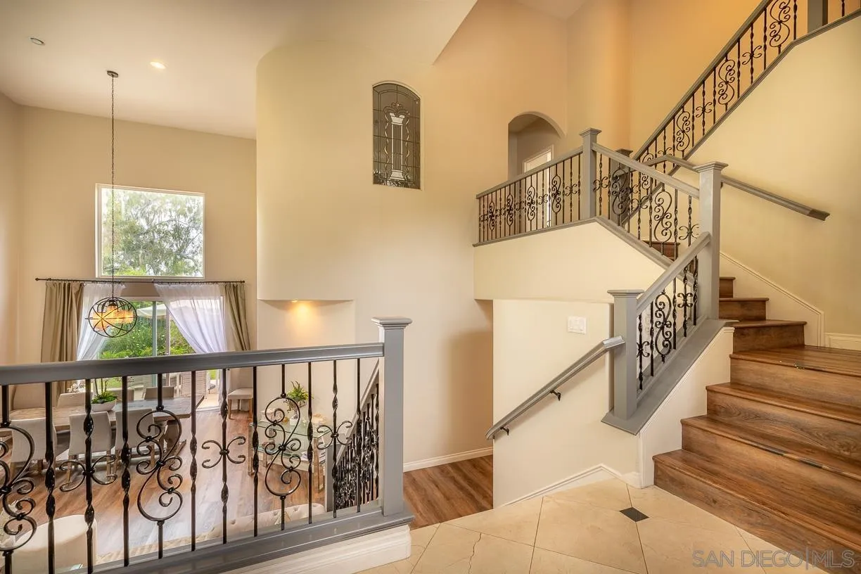 2435 Ridgegate Row La Jolla, CA 92037 - Photo 2 of 30 a view of entryway and hall with wooden floor