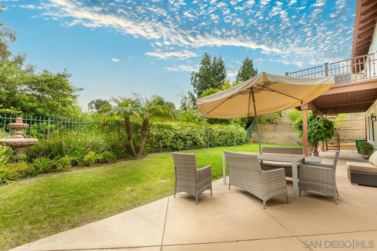2435 Ridgegate Row La Jolla, CA 92037 - Photo 27 of 30 a view of backyard with outdoor seating and green space