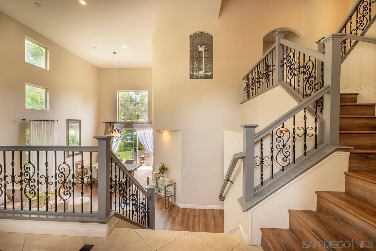 2435 Ridgegate Row La Jolla, CA 92037 - Photo 3 of 30 a view of entryway and hall with wooden floor