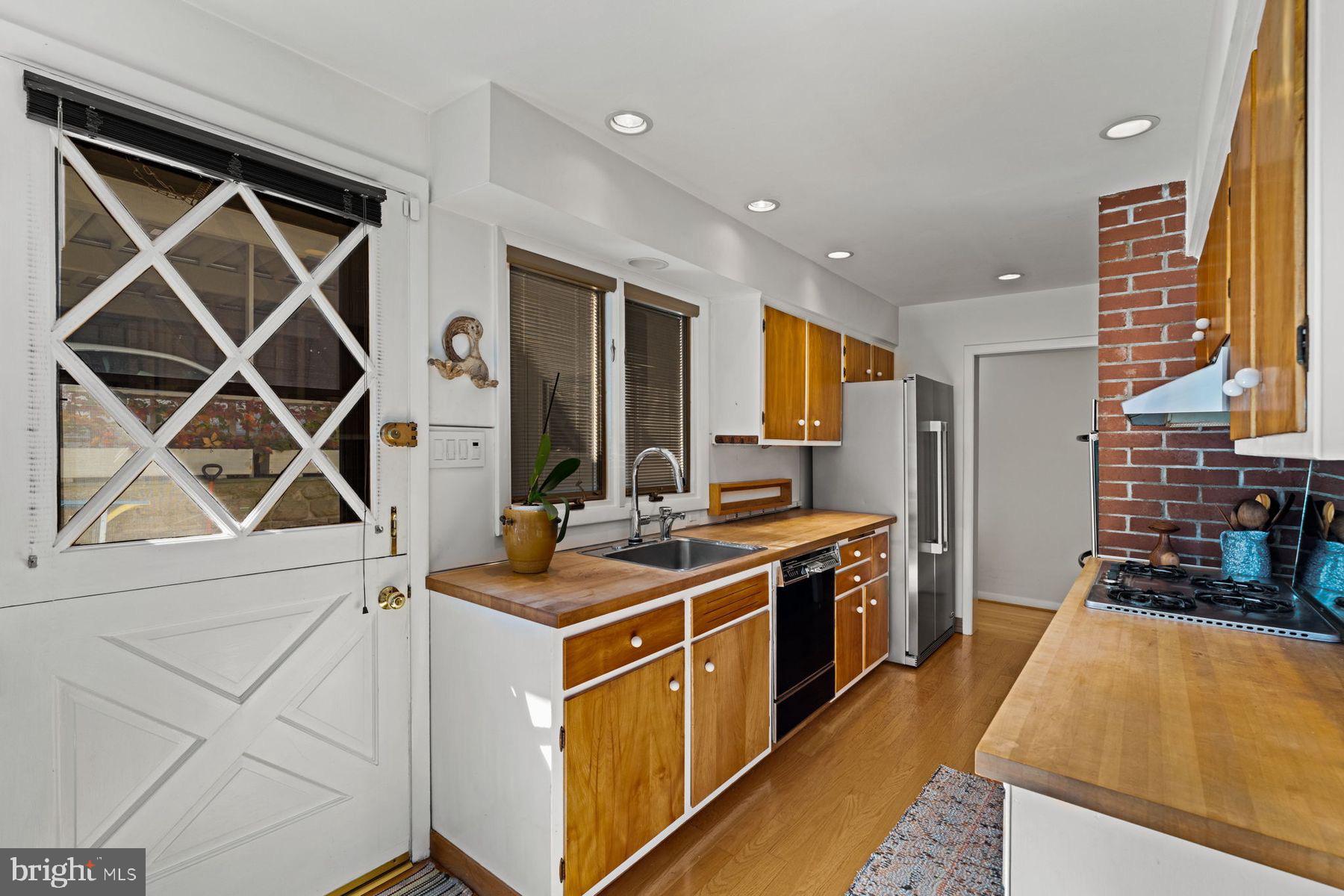 809 Church Road Wyncote, PA 19095 - Photo 7 of 20 Charming kitchen with warm wood accents.