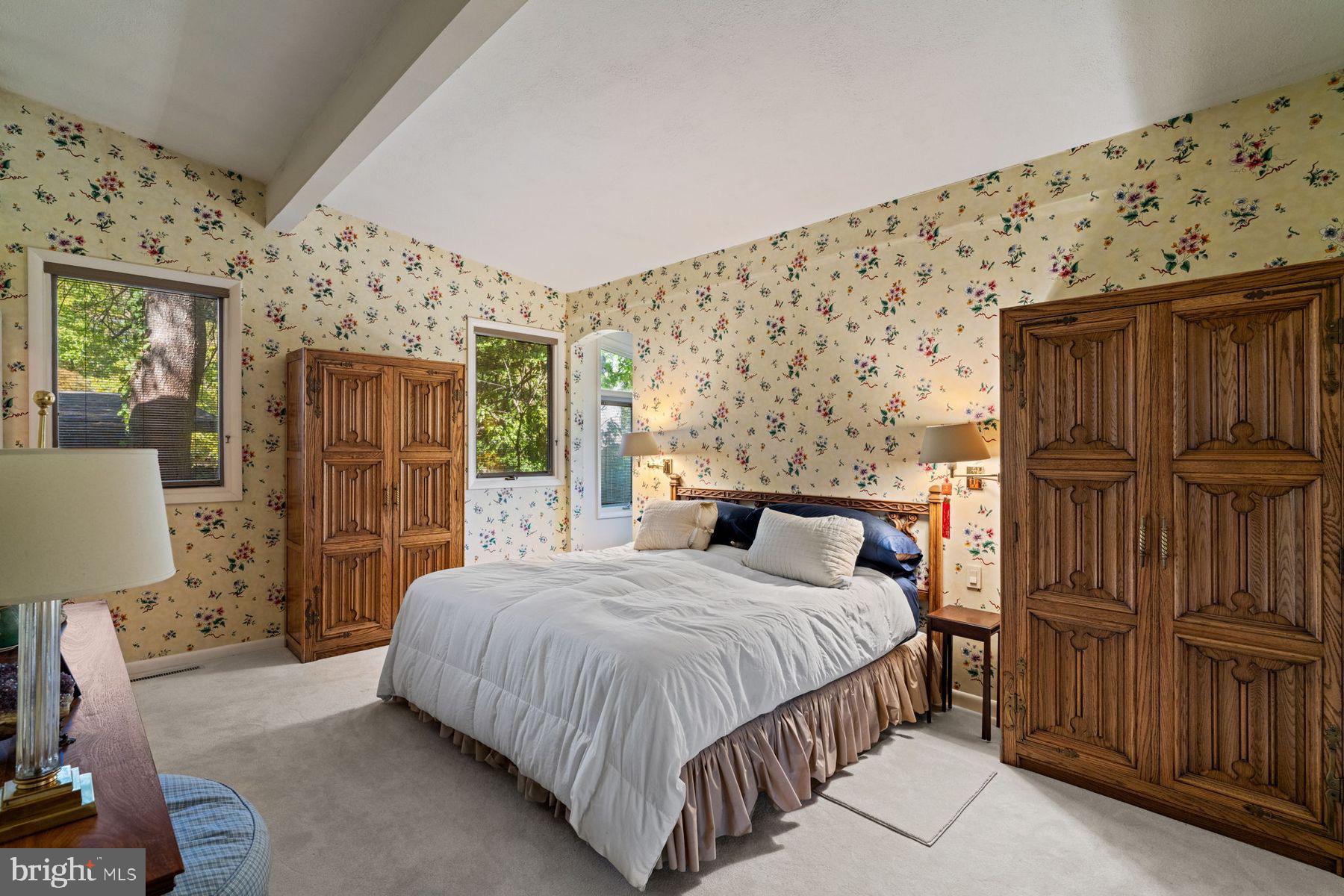 809 Church Road Wyncote, PA 19095 - Photo 8 of 20 Charming bedroom with floral accents.