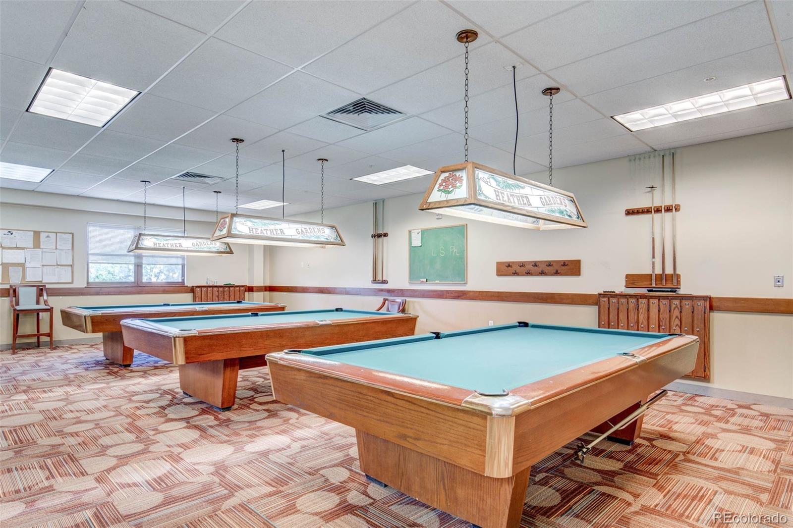 3082 South Wheeling Way, Unit 104 Aurora, CO 80014 - Photo 27 of 27 a room with pool table and windows