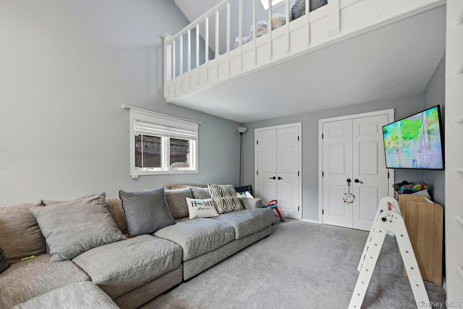 12 Sherman Road Glen Cove, NY 11542 - Photo 14 of 27 a living room with furniture and a window
