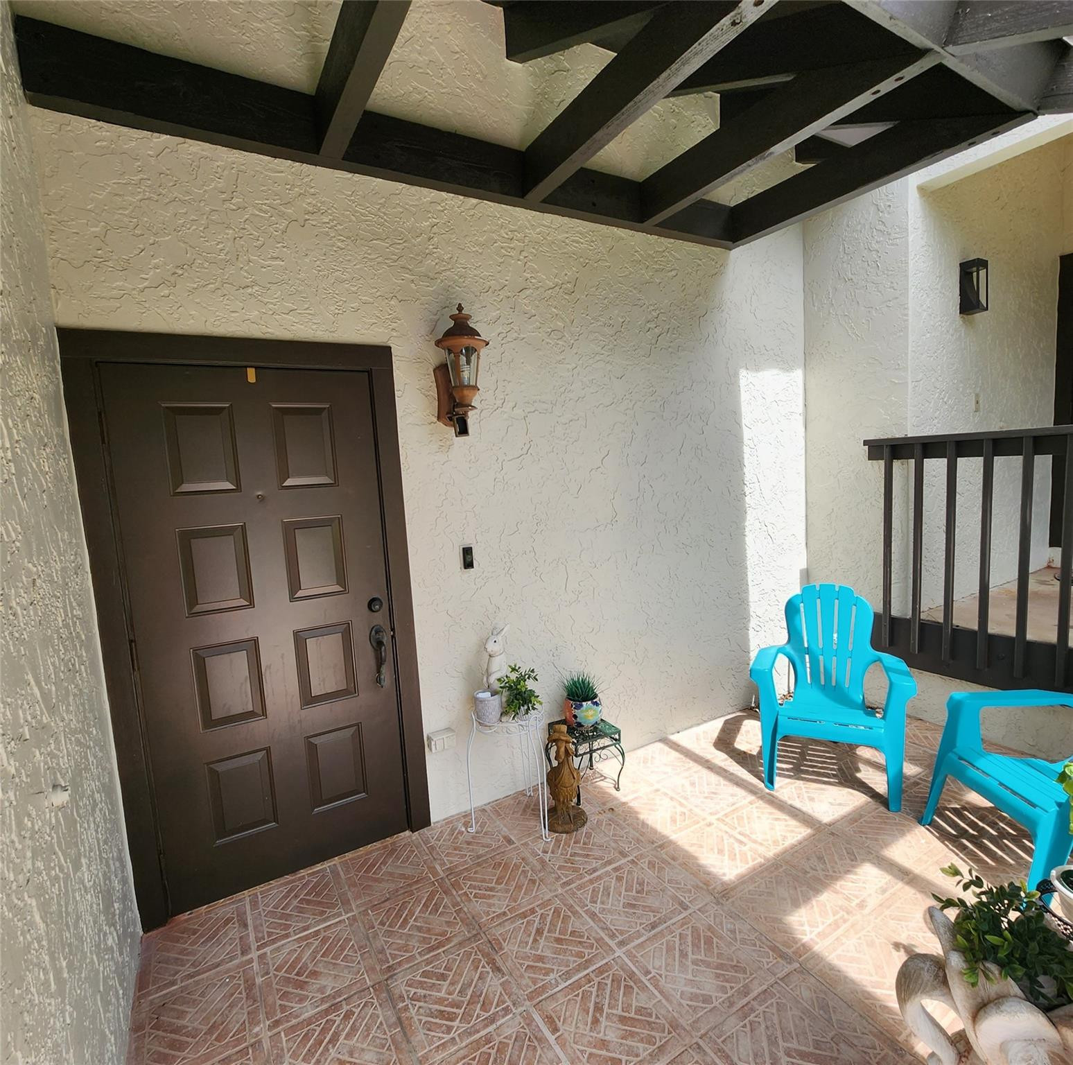 5762 Fox Hollow Drive, Unit G Boca Raton, FL 33486 - Photo 3 of 53 a bedroom with furniture and a window