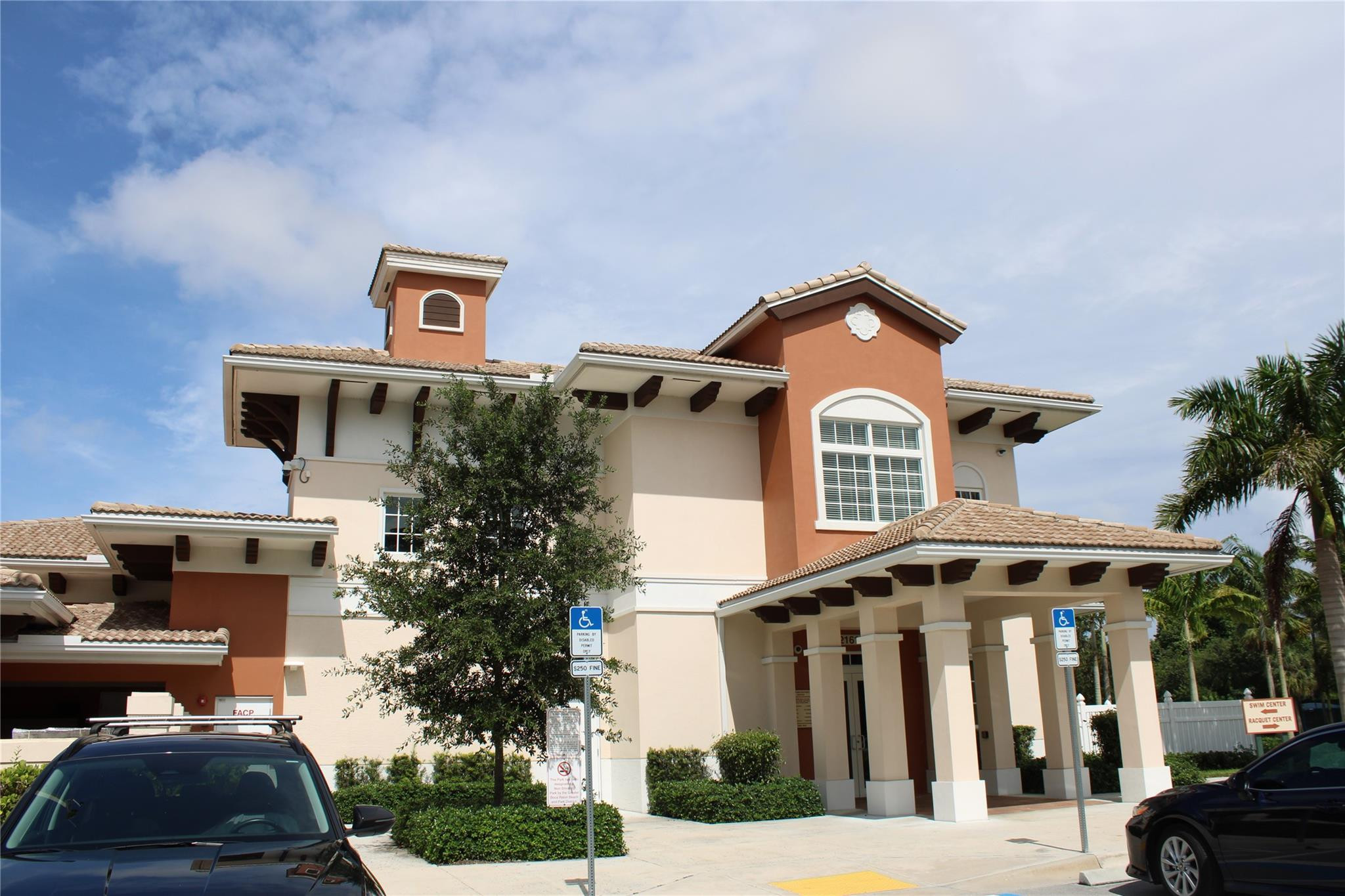 5762 Fox Hollow Drive, Unit G Boca Raton, FL 33486 - Photo 51 of 53 a front view of a house with garden
