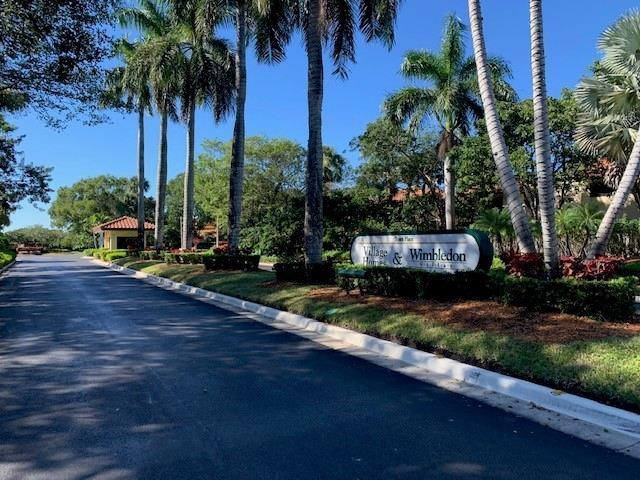 5762 Fox Hollow Drive, Unit G Boca Raton, FL 33486 - Photo 8 of 53 a view of a yard with palm trees