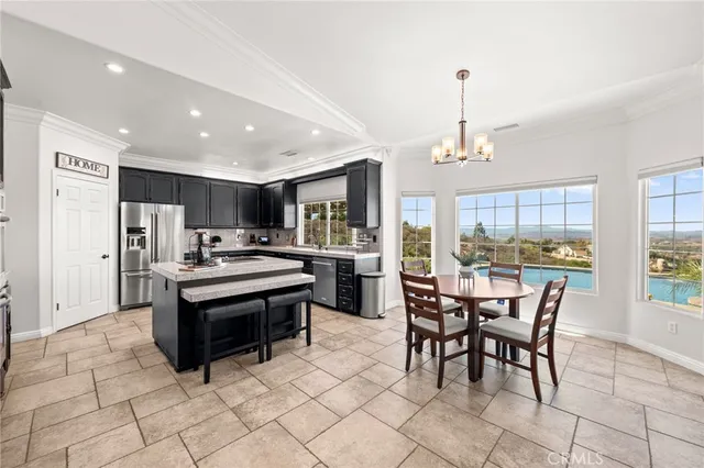 a white bath tub sitting in a bathroom next to a window