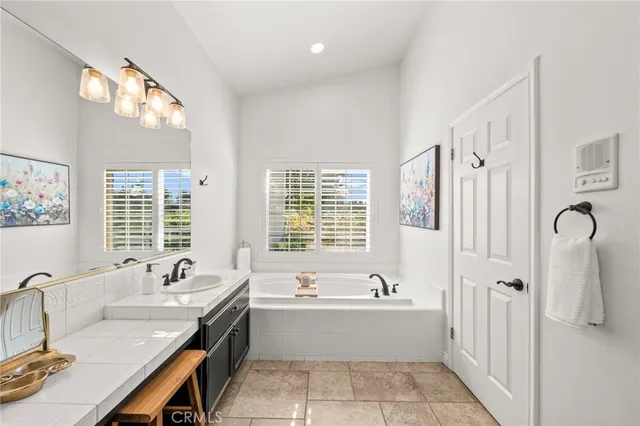 an aerial view of residential houses with outdoor space and river