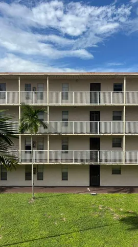 a view of furniture and cabinet in a room