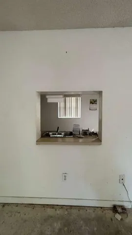 a view of wooden floor and cabinet