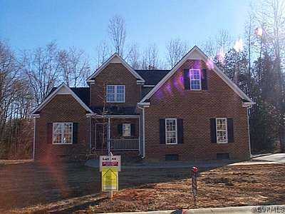 11405 Parsons Chapel Road Glen Allen, VA 23059 - Photo 1 of 1 a front view of a house with trees