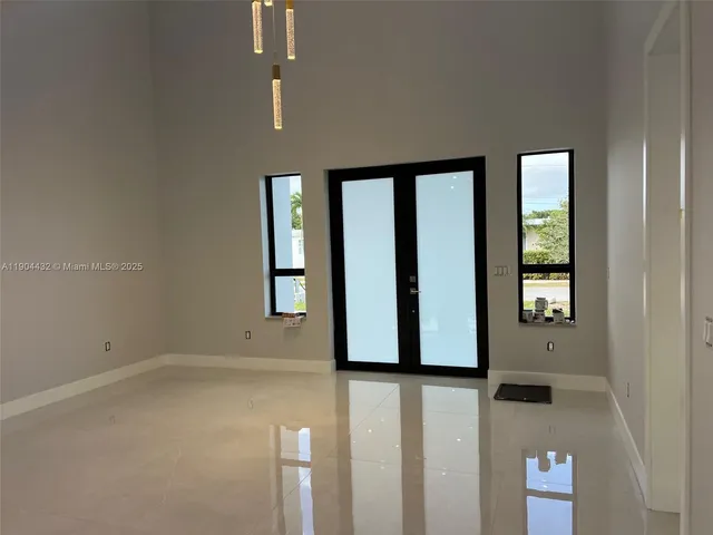an empty room with windows