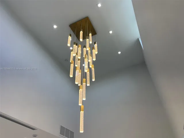 a close view of light fixtures and stairs