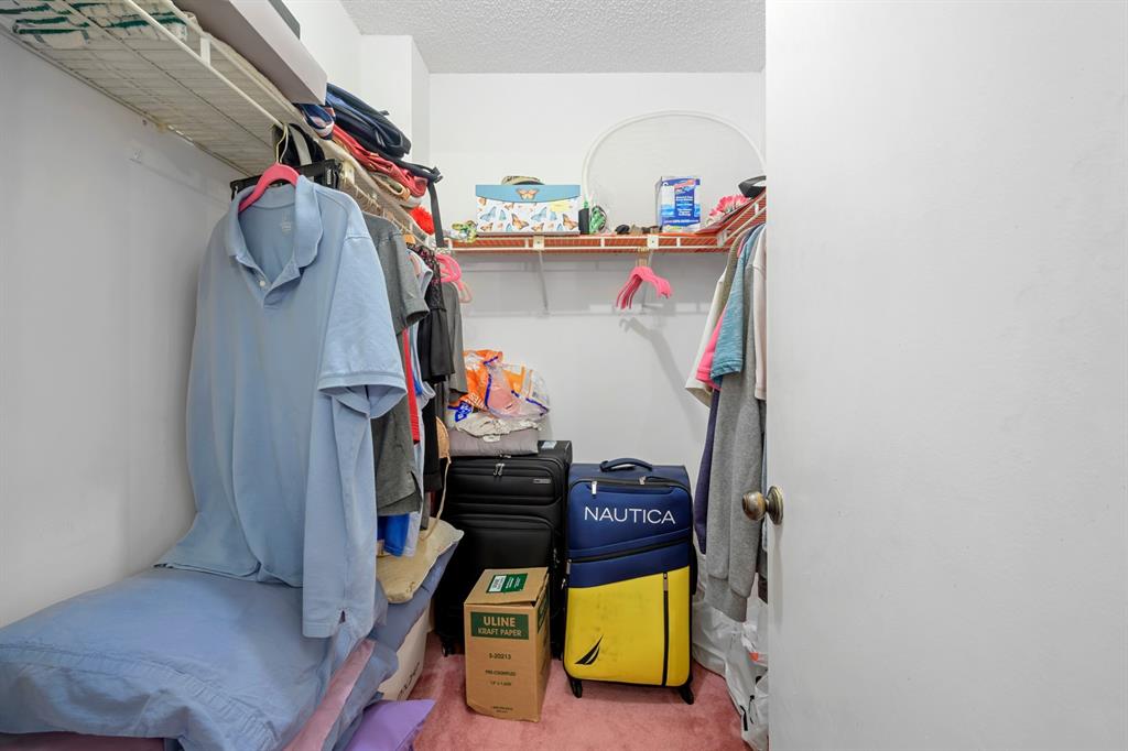 1301 Northeast 7th Street, Unit 113 Hallandale Beach, FL 33009 - Photo 22 of 45 a utility room with dryer and washer