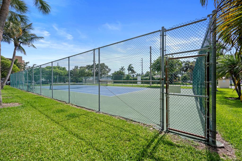 1301 Northeast 7th Street, Unit 113 Hallandale Beach, FL 33009 - Photo 29 of 45 a view of a backyard