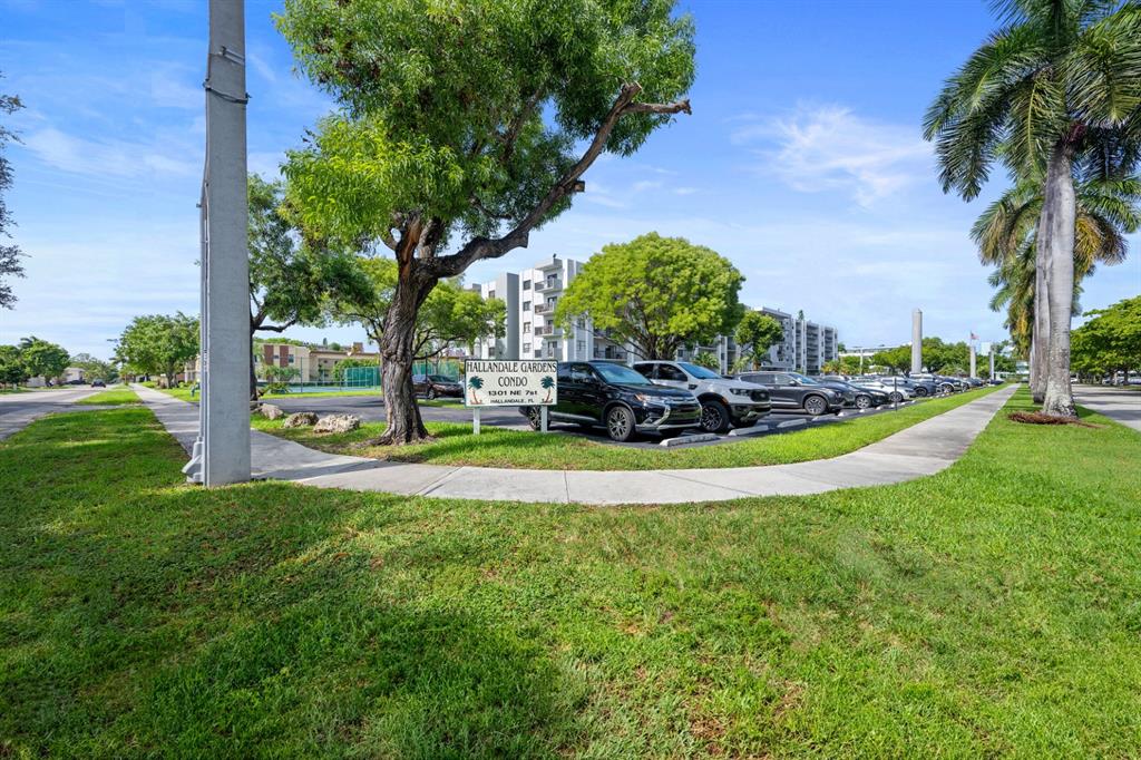 1301 Northeast 7th Street, Unit 113 Hallandale Beach, FL 33009 - Photo 30 of 45 a view of a park with tree s