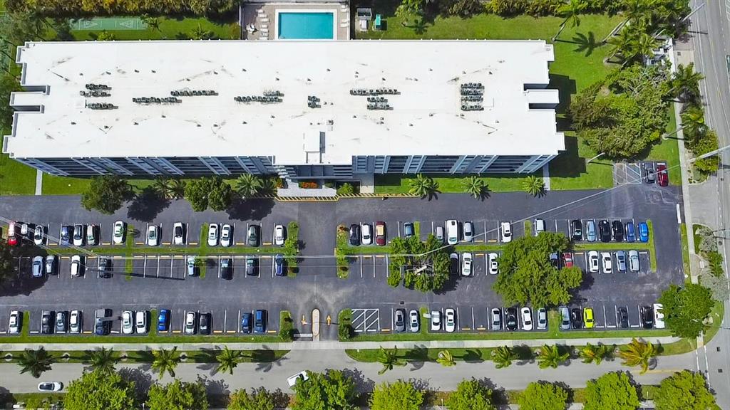 1301 Northeast 7th Street, Unit 113 Hallandale Beach, FL 33009 - Photo 40 of 45 an aerial view of a house with a garden