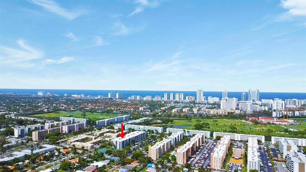 1301 Northeast 7th Street, Unit 113 Hallandale Beach, FL 33009 - Photo 43 of 45 a view of a city with a lake