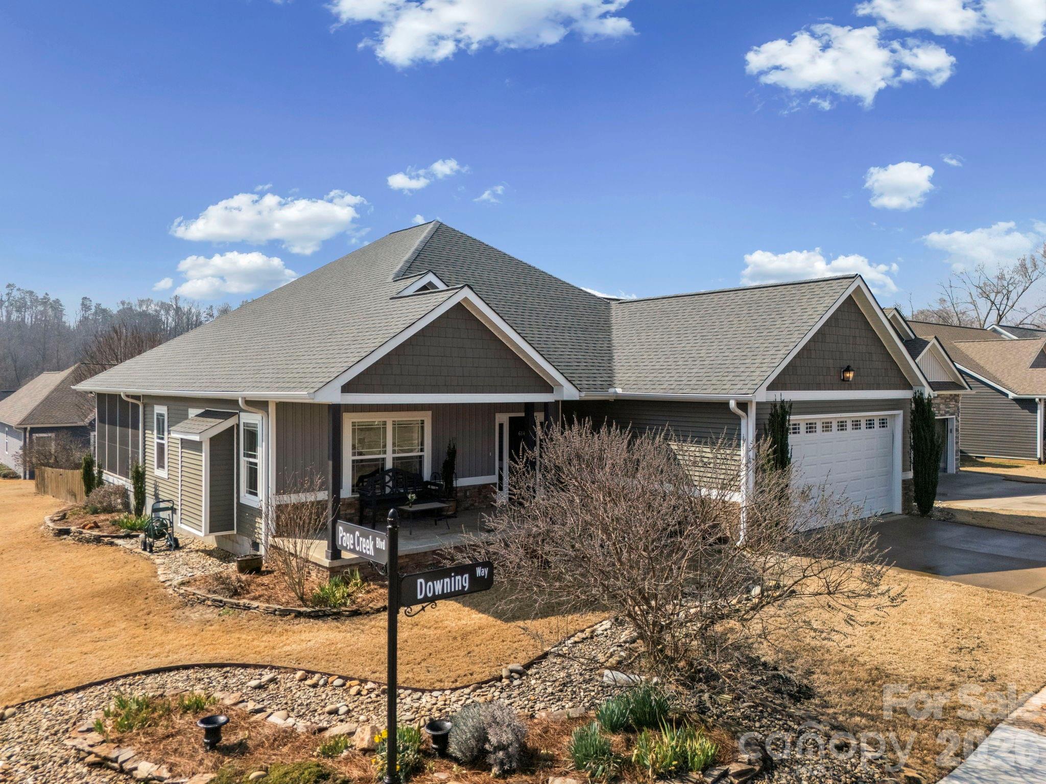 614 Downing Way Landrum, SC 29356 - Photo 2 of 46 a front view of a house with yard