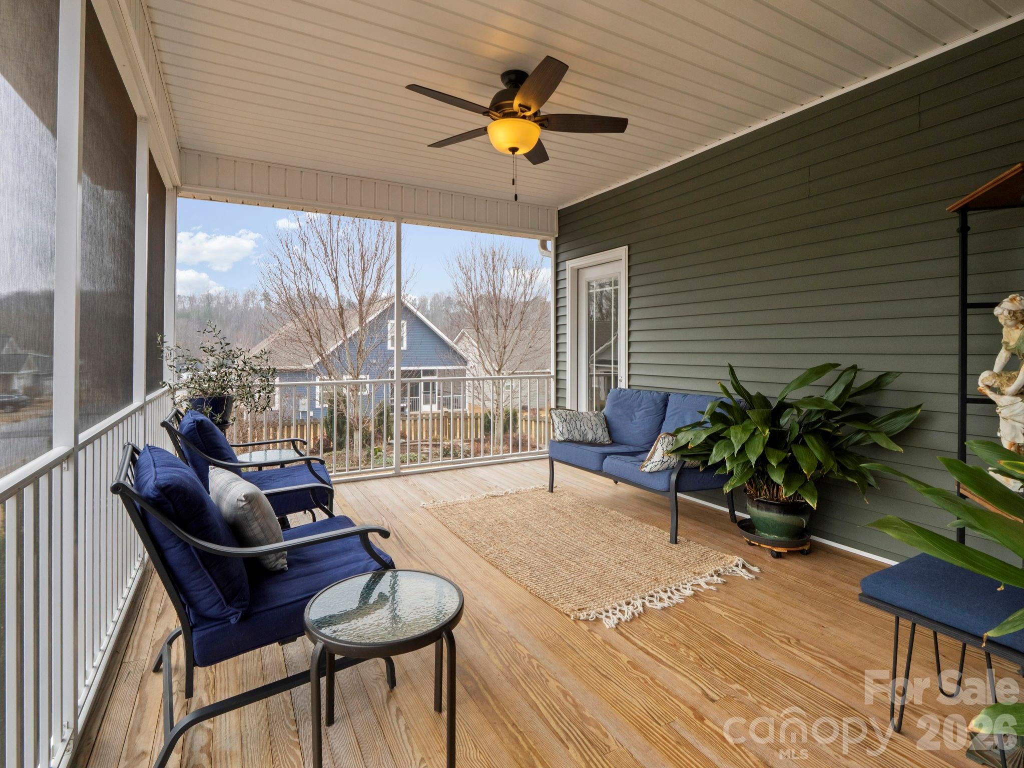 614 Downing Way Landrum, SC 29356 - Photo 33 of 46 a living room with furniture and a potted plant