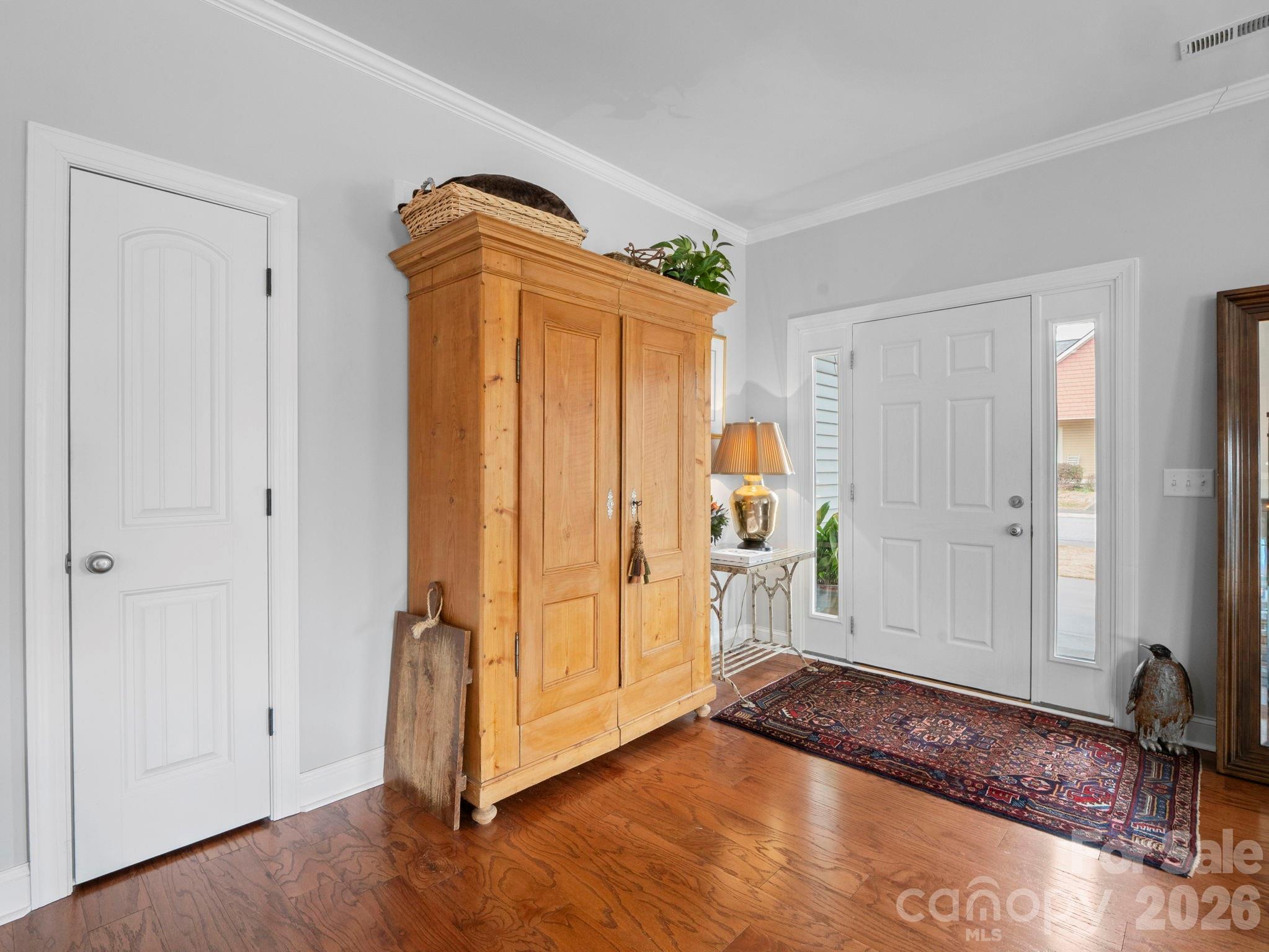 614 Downing Way Landrum, SC 29356 - Photo 6 of 46 a view of front door with wooden floor