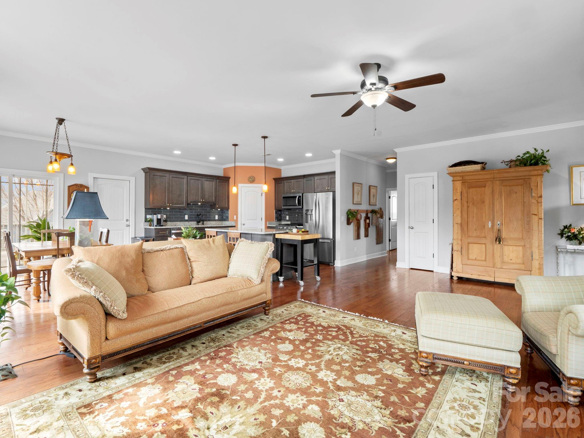 614 Downing Way Landrum, SC 29356 - Photo 10 of 46 a living room with furniture and kitchen view