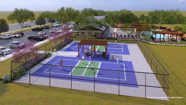 a view of a wooden deck and a yard