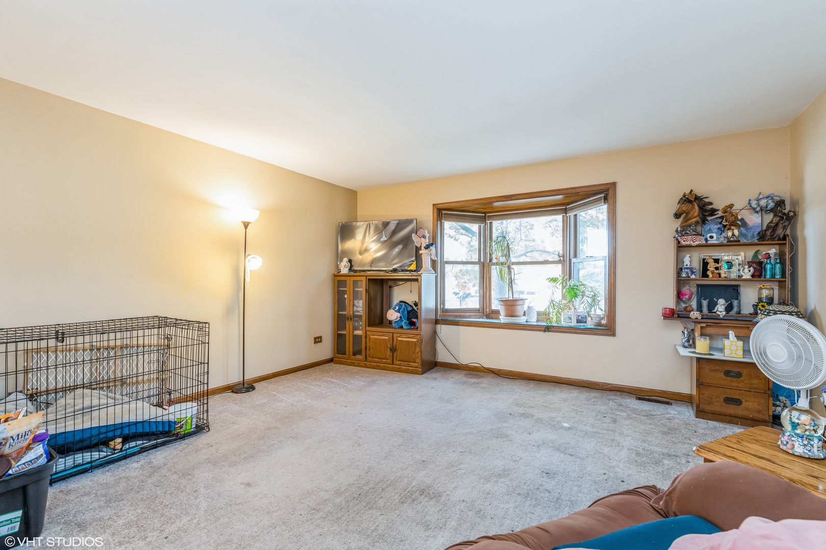 81 Tweed Road Fox Lake, IL 60020 - Photo 4 of 15 a view of an empty room with a window