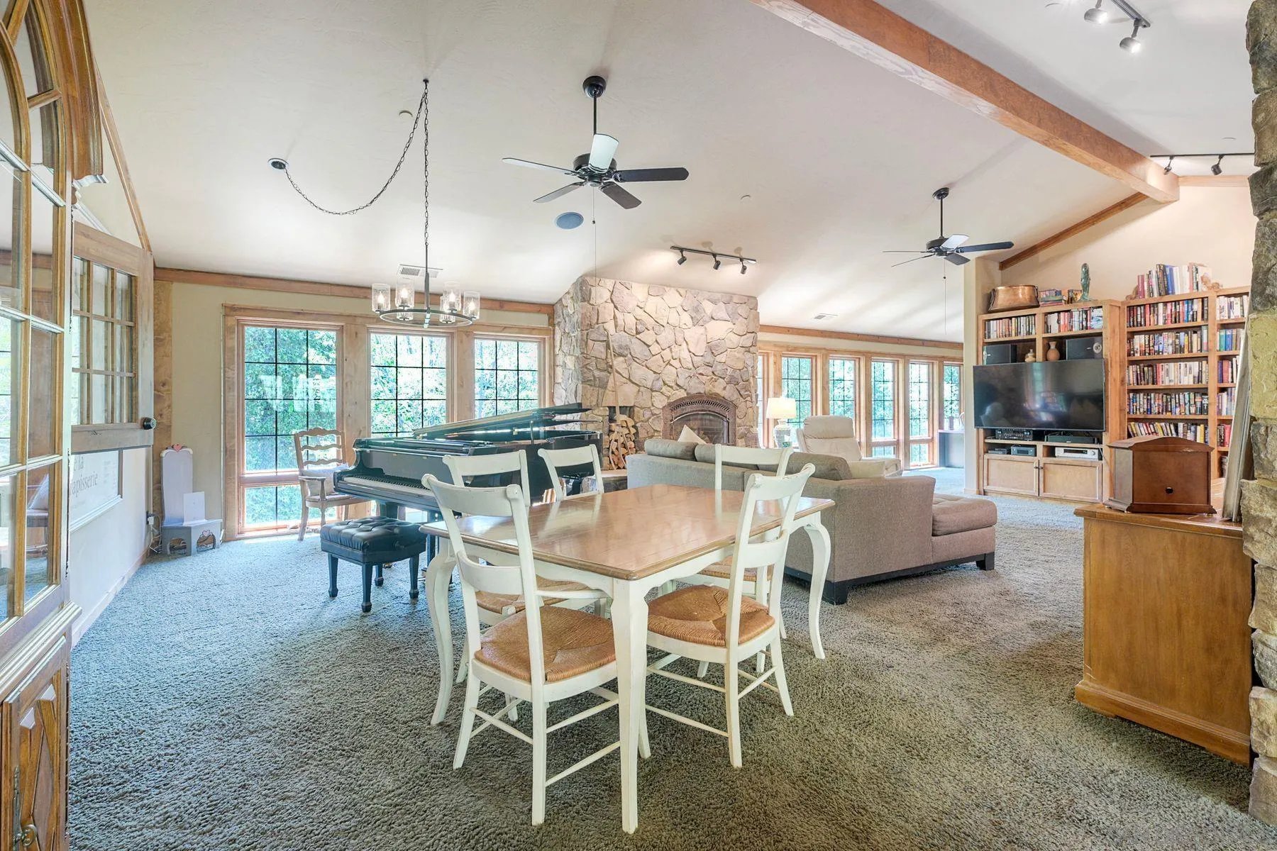 1055 West Incense Cedar Road Julian, CA 92036 - Photo 12 of 56 a dining room with furniture a chandelier and window