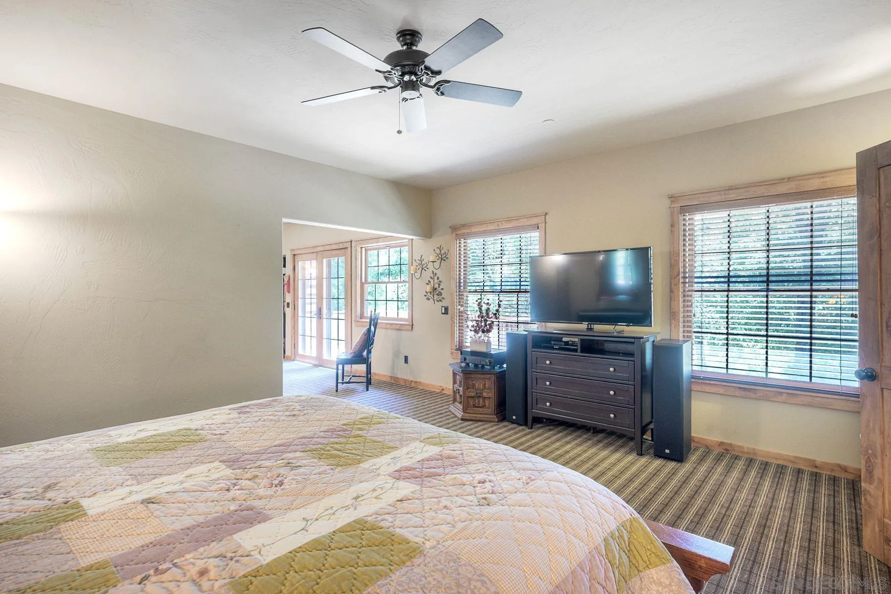 1055 West Incense Cedar Road Julian, CA 92036 - Photo 33 of 56 a bedroom with a bed and a flat screen tv