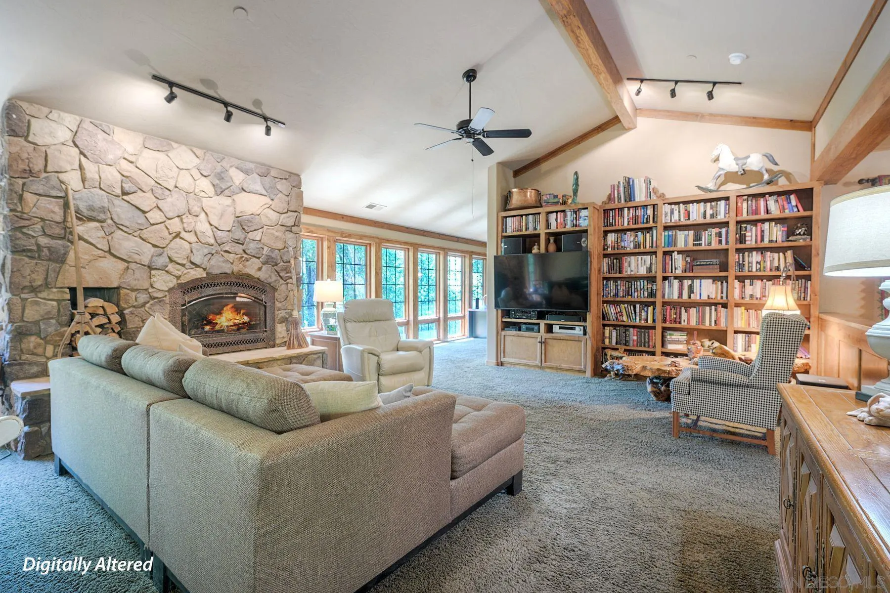 1055 West Incense Cedar Road Julian, CA 92036 - Photo 10 of 56 a living room with furniture and a fireplace