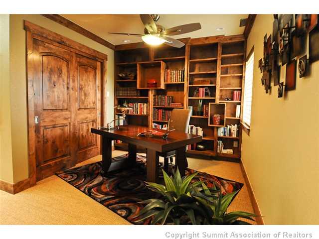 487 Main Street, Unit D Frisco, CO 80443 - Photo 12 of 25 a dining room with furniture and wooden floor